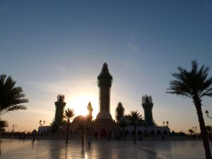 sun sets on la grande mosquée de Touba