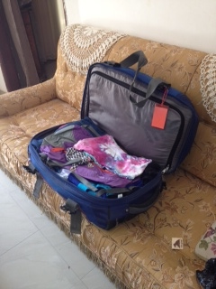 Stuffed to the gills (and only a wee 2 kilos over the limit) and getting ready to leave Senegal to take mile 44,455 to London (with a quick meander through baggage claim and customs in Paris).  As this picture was taken, a few of Callie’s tears were added to the brown and red dirt and white sand from the US, Kenya, and Senegal; the six months in between miles 40,955 and 44, 455 were huge and difficult and joyous and growing and saying goodbye to them was no easy feat.  